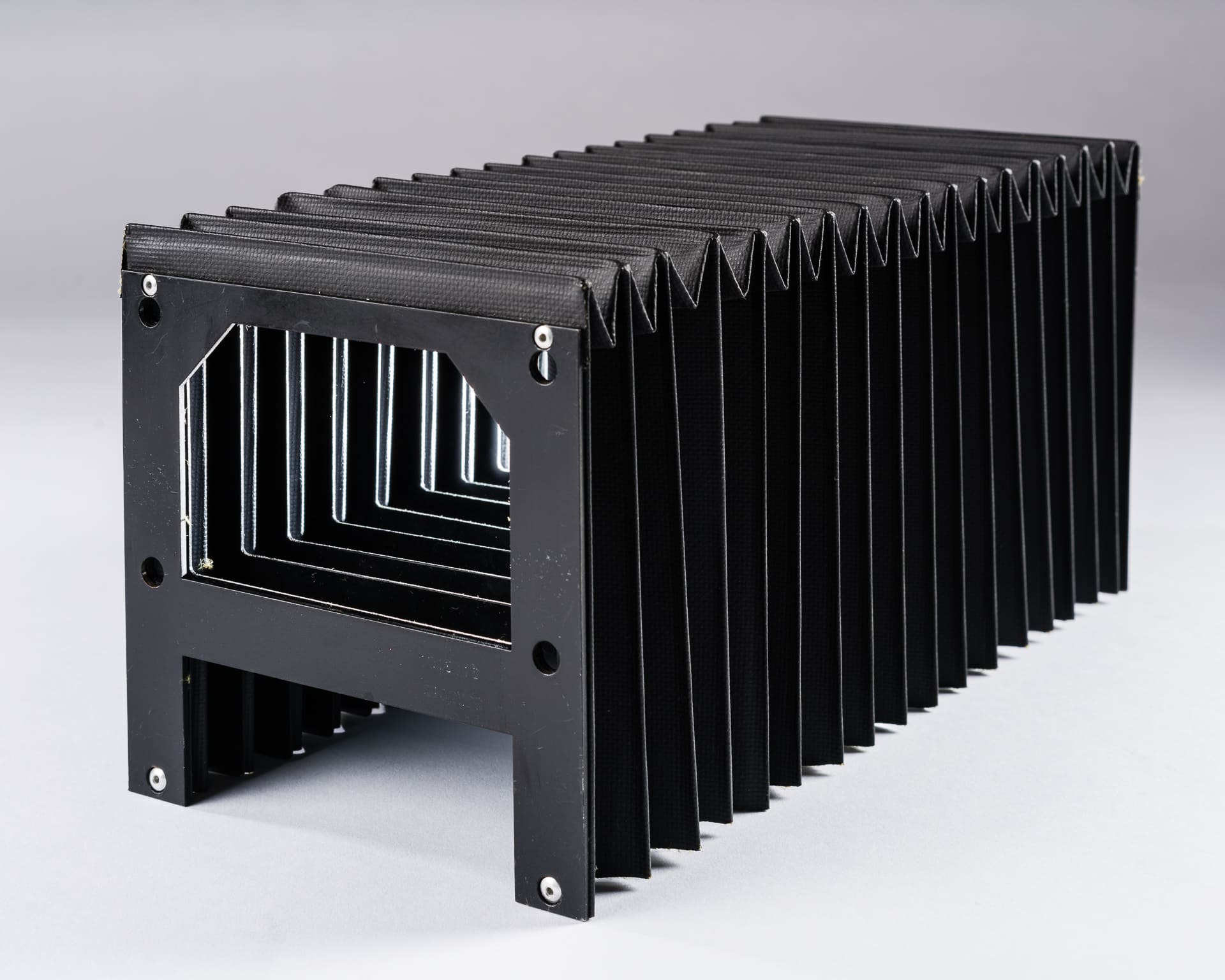 Soufflets de protection plissés pour glissières