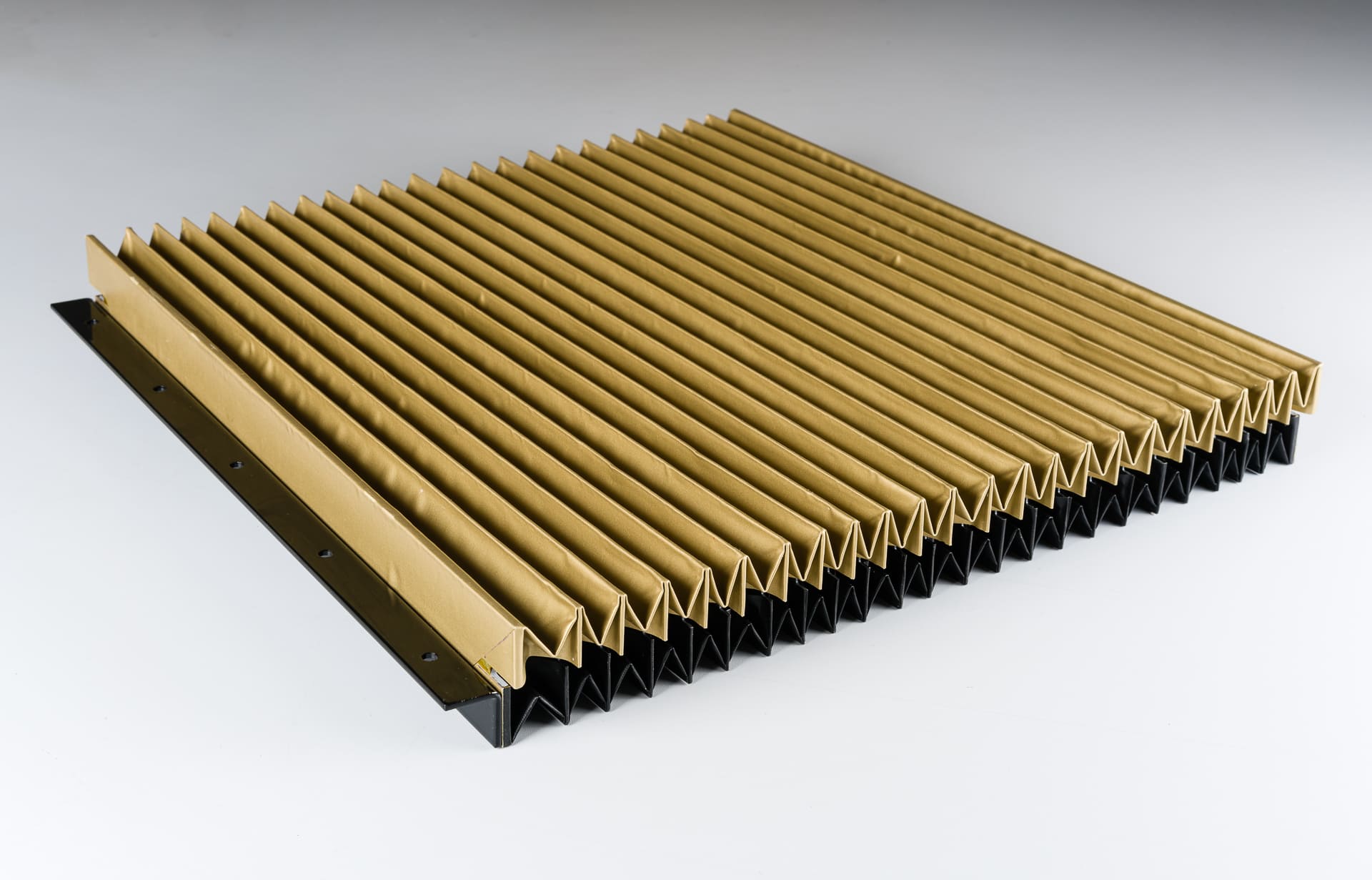 Soufflets de protection plissés pour glissières